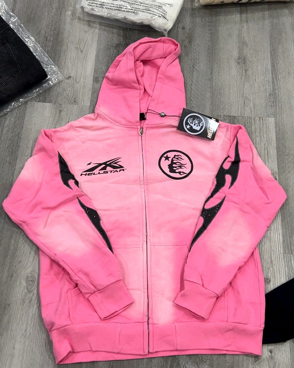 Hellstar pink zip-up hoodie, front